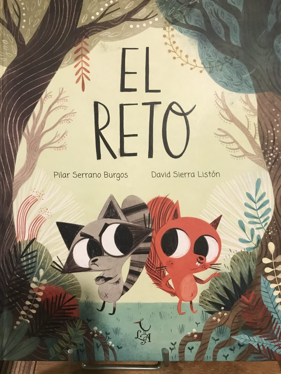 Picture book cover design with a raccoon and squirrel framed by trees and a hand-lettered title