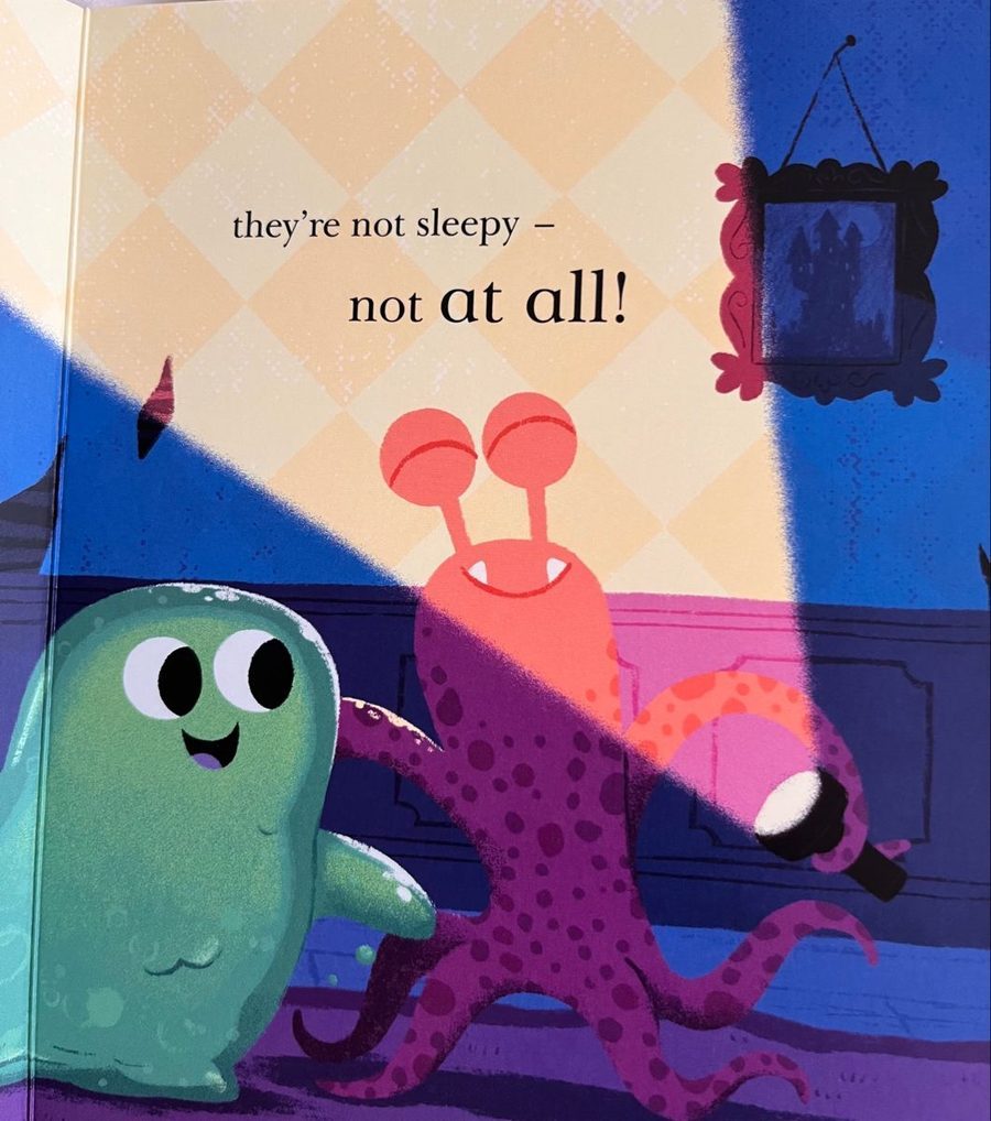 Picture book page with two friendly monsters and large headline text above the art